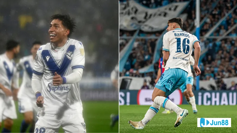 นักเตะของ Racing Club และ Velez Sarsfield กำลังแย่งบอลบนสนามหญ้า นักเตะของ Racing Club และ Velez Sarsfield กำลังแย่งบอลบนสนามหญ้า